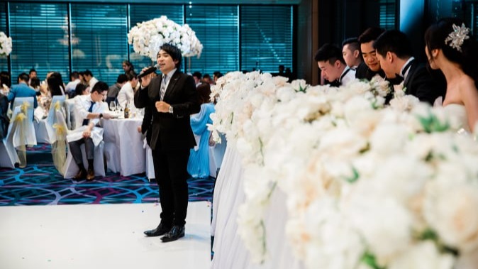 Sy Chung Chinese Wedding MC hosting a reception